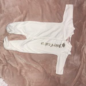A 3/6 month juicy couture onesie, for a baby girl.